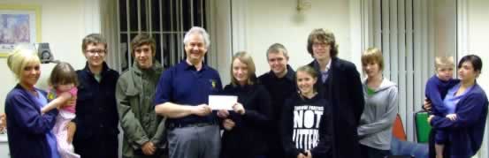 Members of St. Andrew's Youth Cabinet present &pound;350 proceeds of concert to Zoe's Place.
